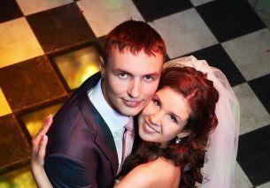 Photo of bride and groom dancing 